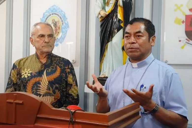 Timor-Leste's cardinal-elect, Archbishop Dom Vigilio do Carmo da Silva of Dili, and President Jose Ramos-Horta speak to reporters on May 30 in Dili