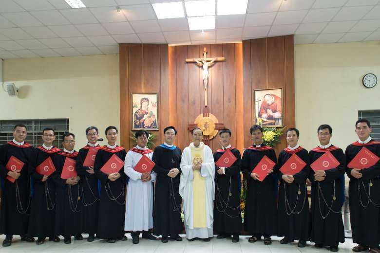 Students with their diplomas at Saint Alphonsus Theologate in Vietnam