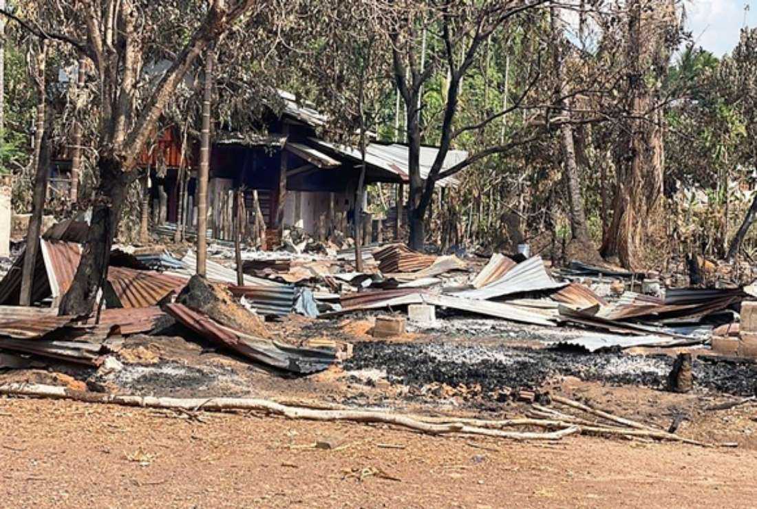 Burned remains of houses after airstrikes and mortar attacks by the Myanmar military on a village in Doo Tha Htoo district in eastern Myanmar's Kayin state on May 3