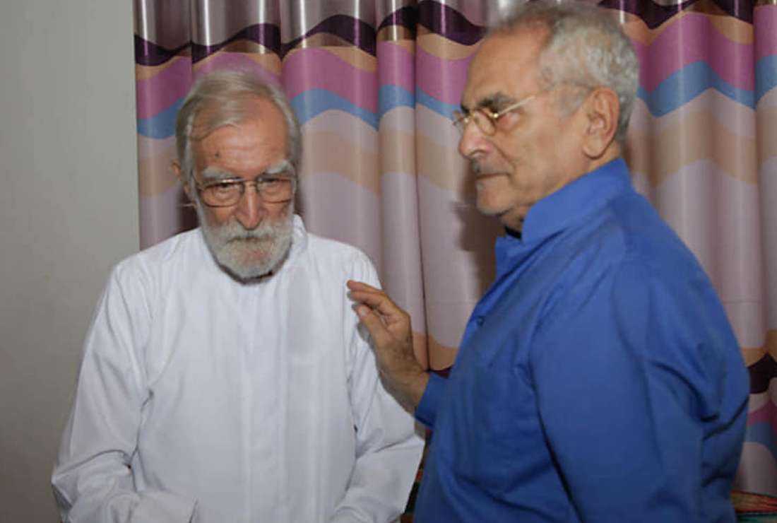 President José Ramos-Horta (right) greets Father João Baptista Felgueiras on June 9 as the Jesuit priest celebrates his 101st birthday
