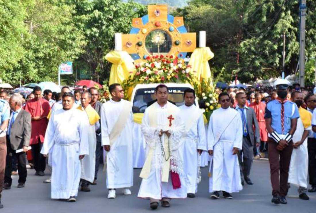Cardinal-elect Archbishop Dom Virgilio do Carmo da Silva of Dili (center) leads Catholics in a solemn procession of the Blessed Sacrament on June 16