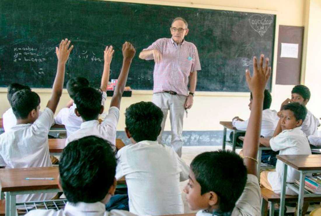 Marist Brother Eugenio Sanz teaches a class at St. Marcellin High School in Moulvibazar, Bangladesh, on June 1