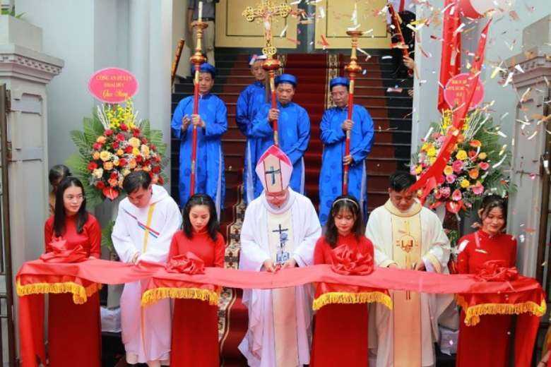 Archbishop Joseph Vu Van Thien accompanied by priests inaugurates a new church in Dong Nhan Subparish in Hanoi on May 27