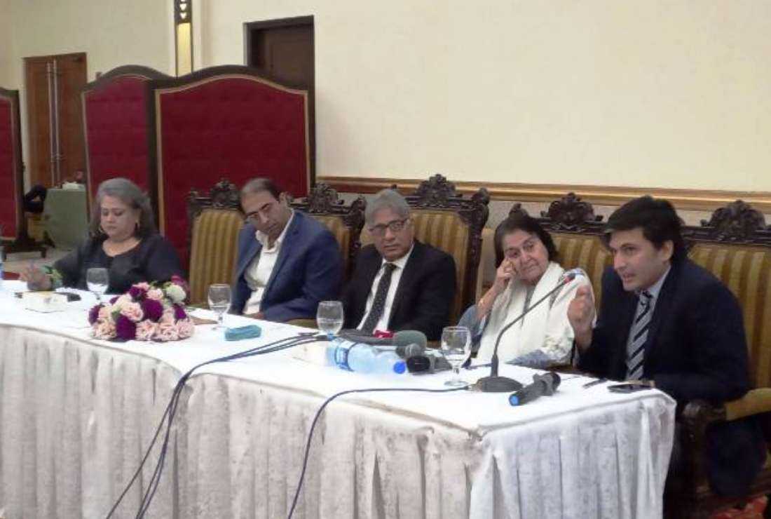 Peter Jacob (center), executive director of the Centre for Social Justice, with other participants at a media conference in Lahore, Pakistan, on June 18