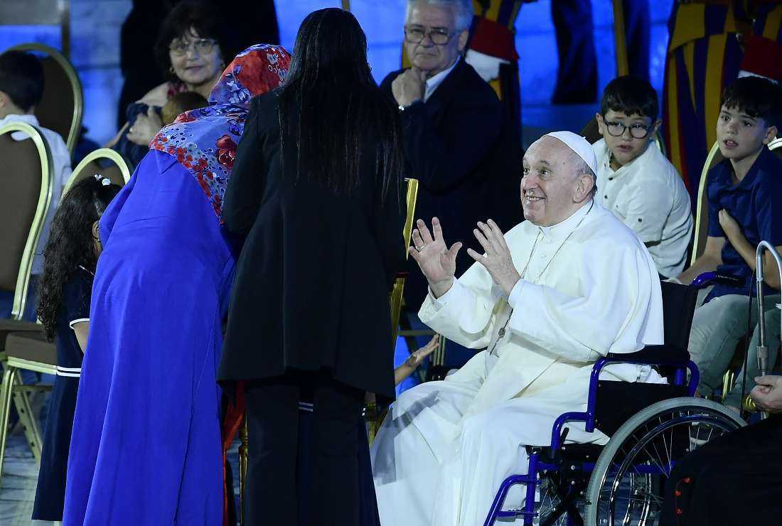 Pope Francis meets with Zakia Seddiki (center), the widow of murdered Italian ambassador Luca Attanasio, her mother (left) and her children after her address during an audience as part of the Festival of Families on June 22 in the Vatican