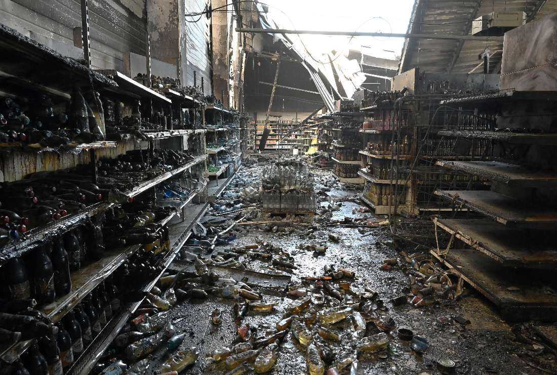 Charred goods in a grocery store of the destroyed Amstor mall in Kremenchuk on June 28, one day after it was hit by a Russian missile strike