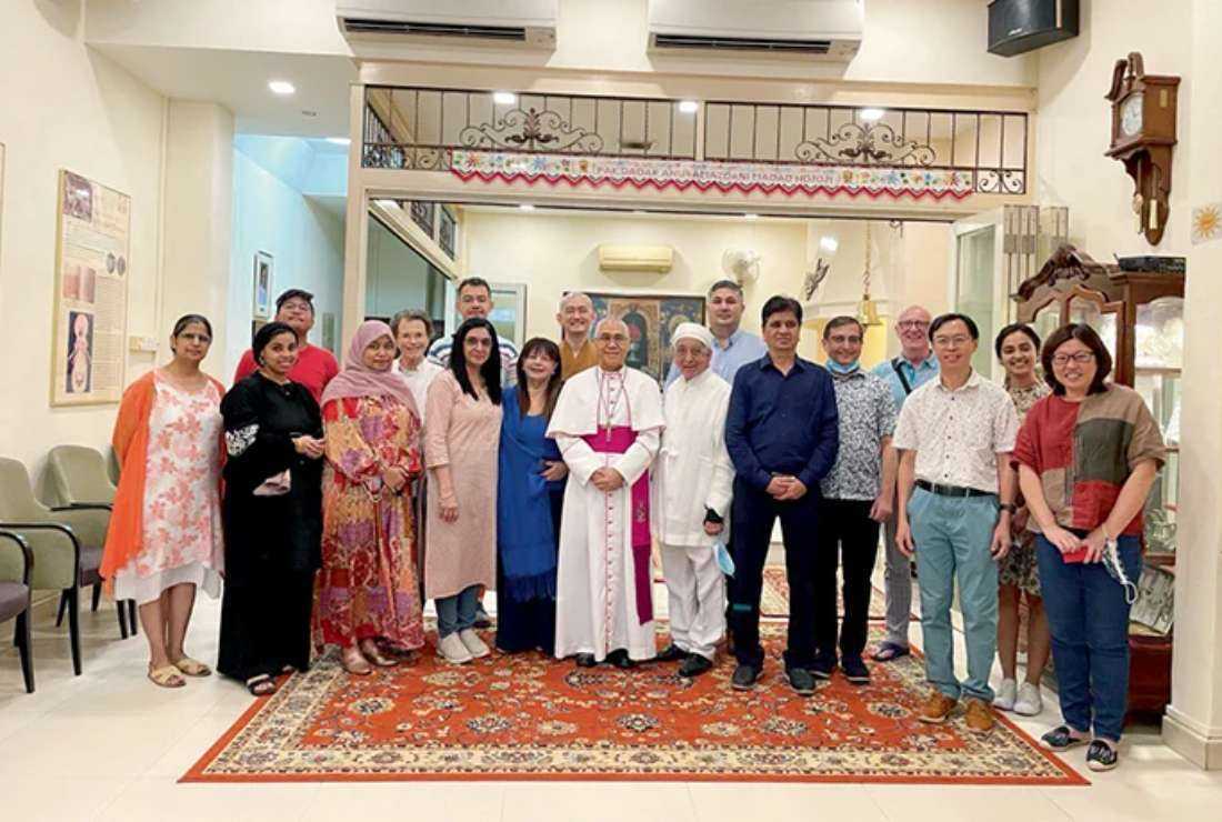 Cardinal-elect William Goh (center) with other Catholics, members of other faiths and the Parsi Zoroastrian community at the Zoroastrian museum in Singapore on June 18