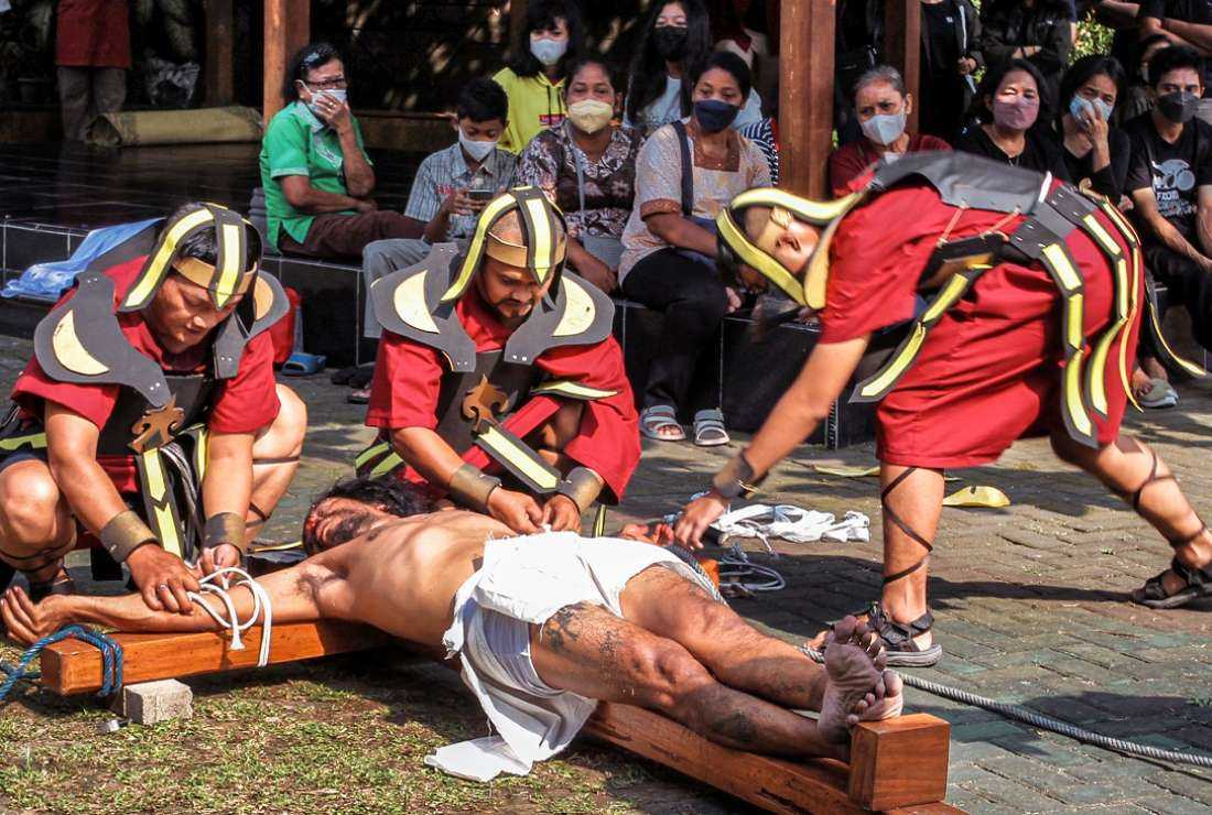 Christians perform the crucifixion of Jesus during the Good Friday service at Santo Yakobus Church in Bantul, Yogyakarta, on April 15. Pope Francis has cited Indonesia as a place to find new vocations to the priesthood and religious life