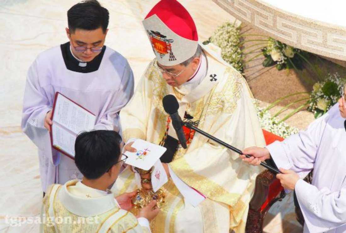Archbishop Joseph Nguyen Nang ordains a priest at Notre Dame Cathedral in Ho Chi Minh City on June 24