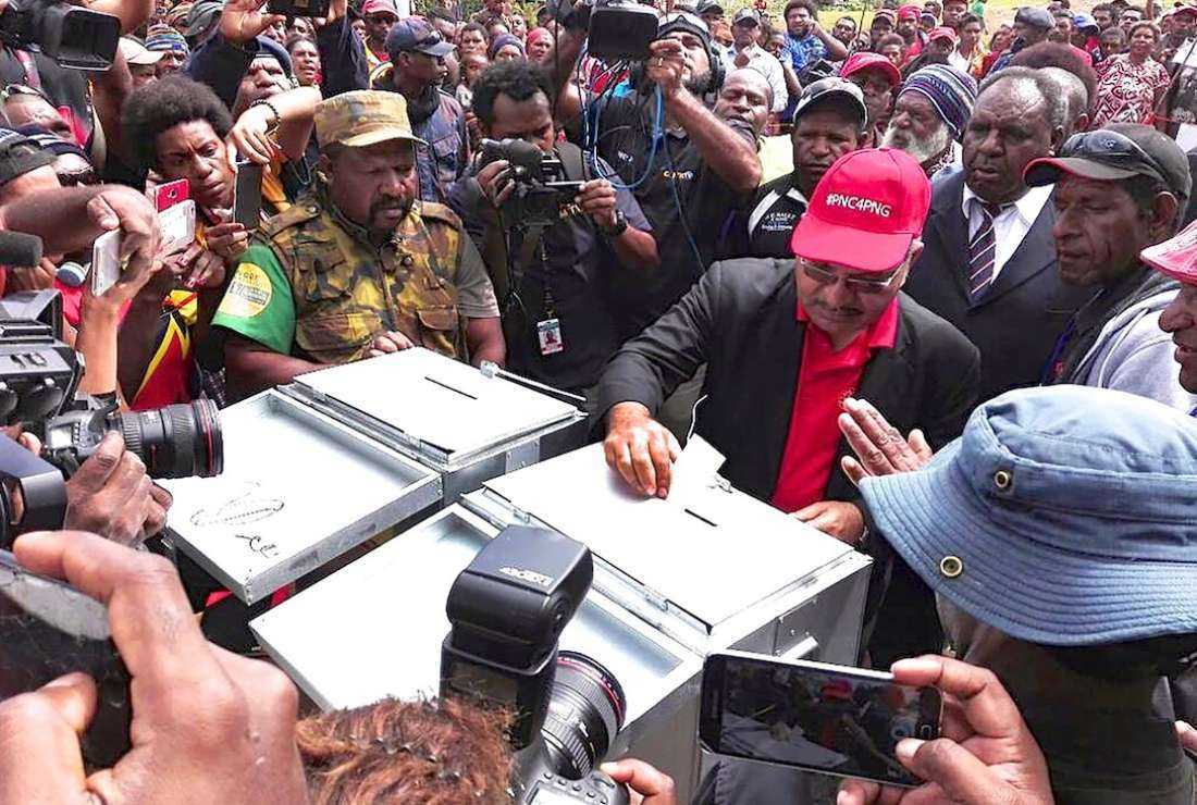 Peter O'Neill, then prime minister, votes in Papua New Guinea's general election on July 2, 2017