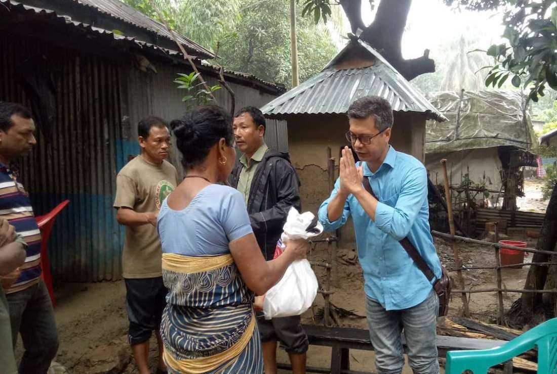 Caritas Bangladesh distributes dry food to flood victims in Mymensingh on June 19