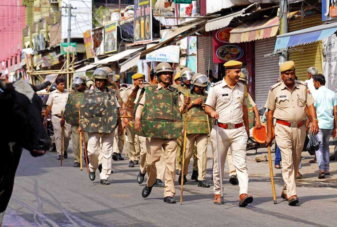Policemen patrol Ajmer on June 29 following the alleged beheading of a Hindu tailor by two Muslim men in Udaipur, which was placed under partial curfew to guard against potential sectarian violence after a video purporting to show the attack went viral