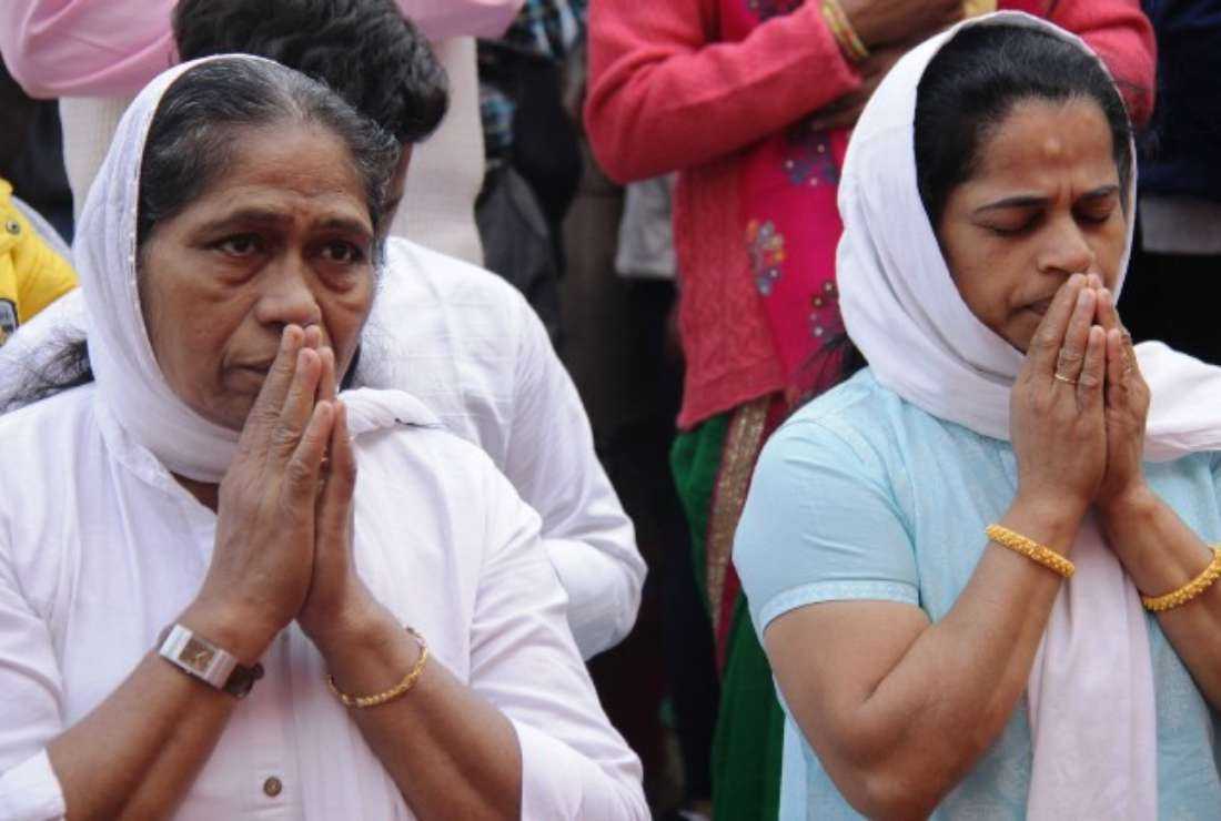 Indian Catholics pray at the yearly feast of Christ the King in New Delhi on Nov. 24, 2018