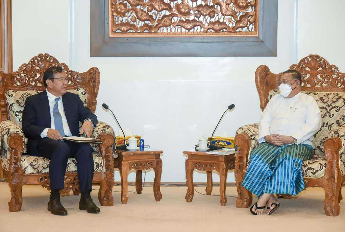 This handout from Cambodia's Foreign Ministry taken on June 30 shows Myanmar Foreign Minister Wunna Maung Lwin (right) meeting with Cambodian Foreign Minister Prak Sokhonn, ASEAN special envoy to Myanmar, in Naypyidaw