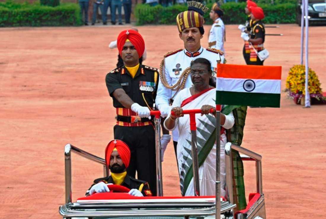 India's new President Droupadi Murmu (center) inspects a guard of honor after her swearing-in ceremony, at the presidential palace Rashtrapati Bhavan in New Delhi on July 25. Murmu is the first person from one of the country's marginalised tribal communities to serve as head of state