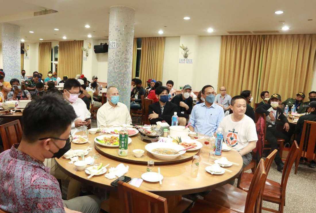 Representatives from Taiwan’s Fisheries Agency, migrant fishermen and government figures from the countries of their origin attend an event sponsored by Stella Maria Kaohsiung on July 16
