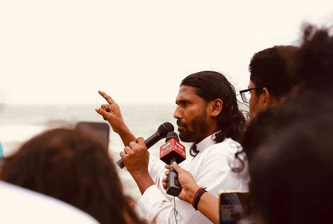 Father Amila Jeewantha Peiris addressing an anti-government protest in Sri Lanka