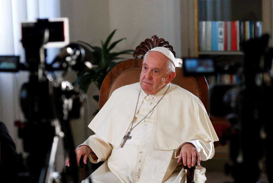 Pope Francis listens to a question during his interview with Reuters Senior Correspondent Philip Pullella