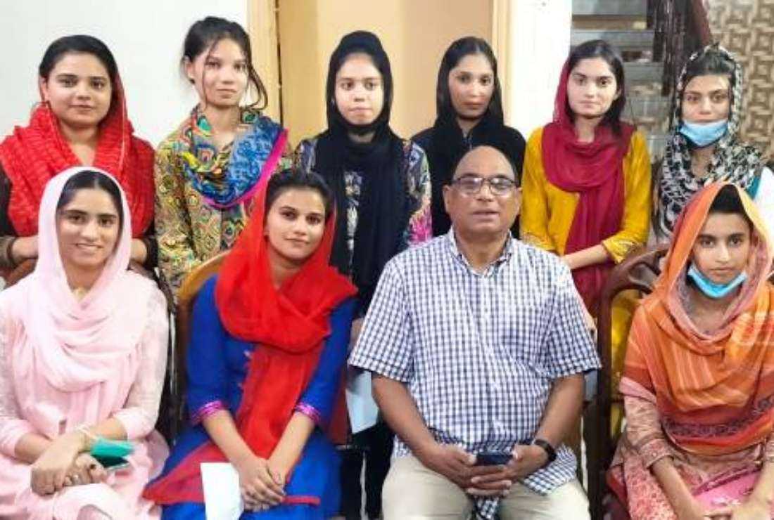 Father Morris Jalal with Catholic students studying at the Punjab Vocational Training Institute in Lahore