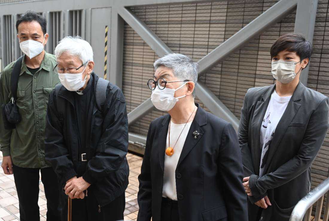 Retired Cardinal Joseph Zen (second from left), one of Asia's highest-ranking Catholic clerics, arrives at court with pro-democracy activists Hui Po-keung (left), pop singer Denise Ho (right) and barrister Margaret Ng (second from right) in Hong Kong on May 24