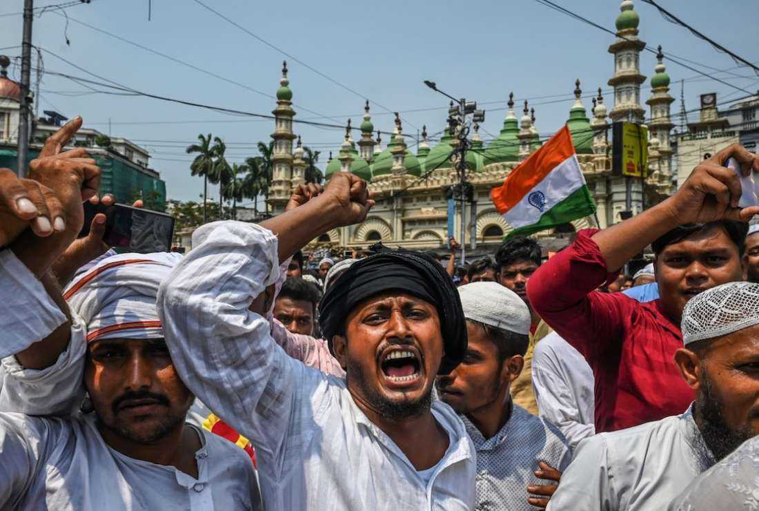 Muslim activists take part in a unity rally to promote communal harmony in Kolkata on June 14 following nationwide protests that erupted after remarks about the Prophet Muhammad by a BJP spokesperson