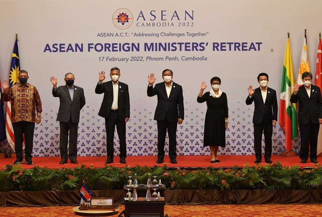 Foreign ministers of the Association of Southeast Asian Nations (ASEAN), from left to right: Malaysia's Saifuddin Abdullah, Philippines' Teodoro Locsin, Singapore's Vivian Balakrishnan, Cambodia's Prak Sokhonn, Indonesia's Retno Marsudi, Laos' Saleumxay Kommasith and ASEAN Secretary-General Lim Jock Hoi pose for a group photo during the ASEAN Foreign Ministers' Retreat in Phnom Penh on Feb 17, 2022