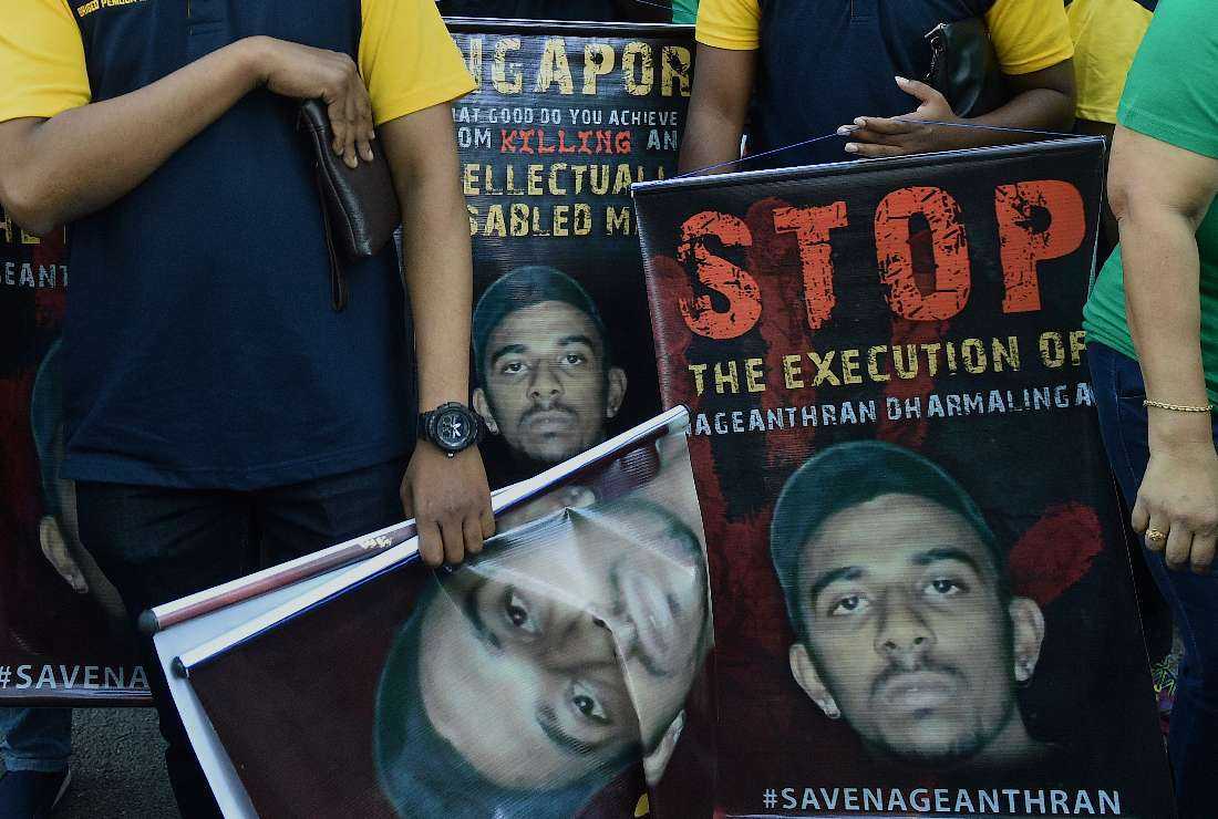 Activists protest against the planned execution of Nagaenthran K. Dharmalingam, a mentally disabled Malaysian man sentenced to death for trafficking heroin into Singapore, outside the Singapore High Commission in Kuala Lumpur on April 23