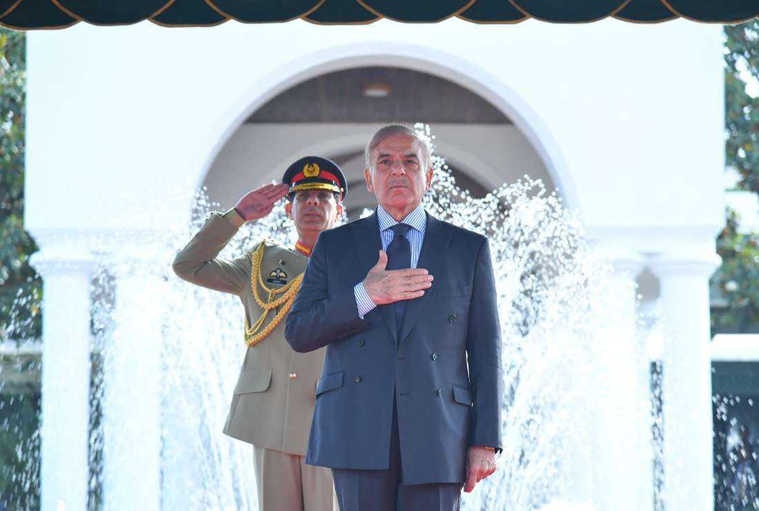 Newly elected Pakistan's Prime Minister Shehbaz Sharif reviews a guard of honor upon his arrival at the Prime Minister's House in Islamabad on April 12