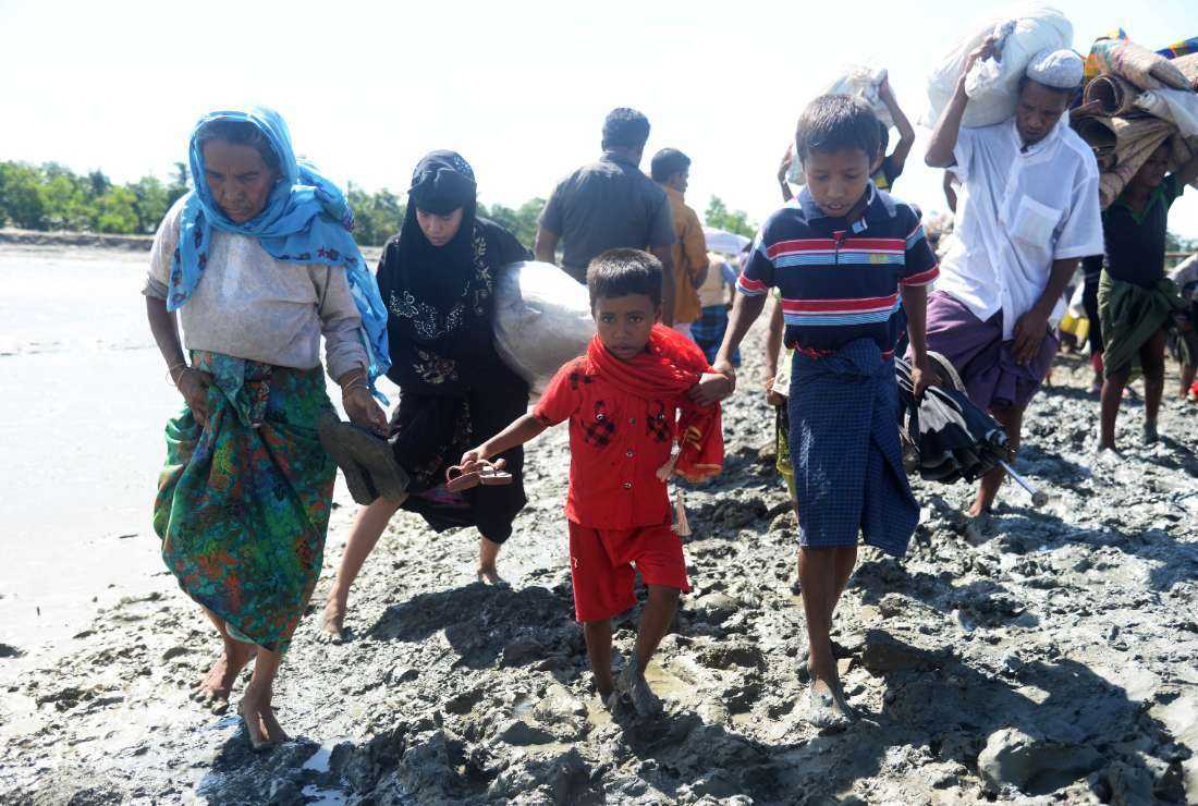 Rohingya refugees enter Bangladesh through Shah Porir Dwip area of Cox's Bazar following the military crackdown in Rakhine state of Myanmar in 2017