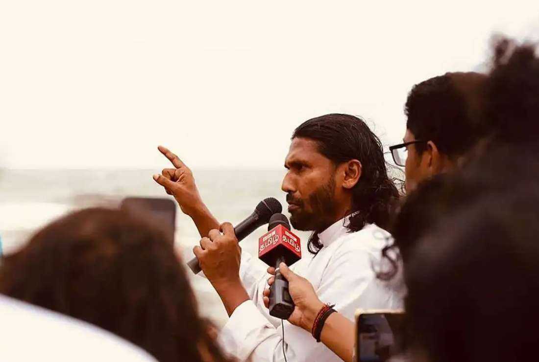 Father Amila Jeewantha Peiris addresses an anti-government protest in Sri Lanka. 