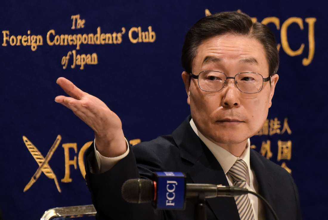 Tomihiro Tanaka, president of the Family Federation for World Peace and Unification (FFWPU), gestures during a press conference at the Foreign Correspondents’ Club of Japan in Tokyo on Aug. 10