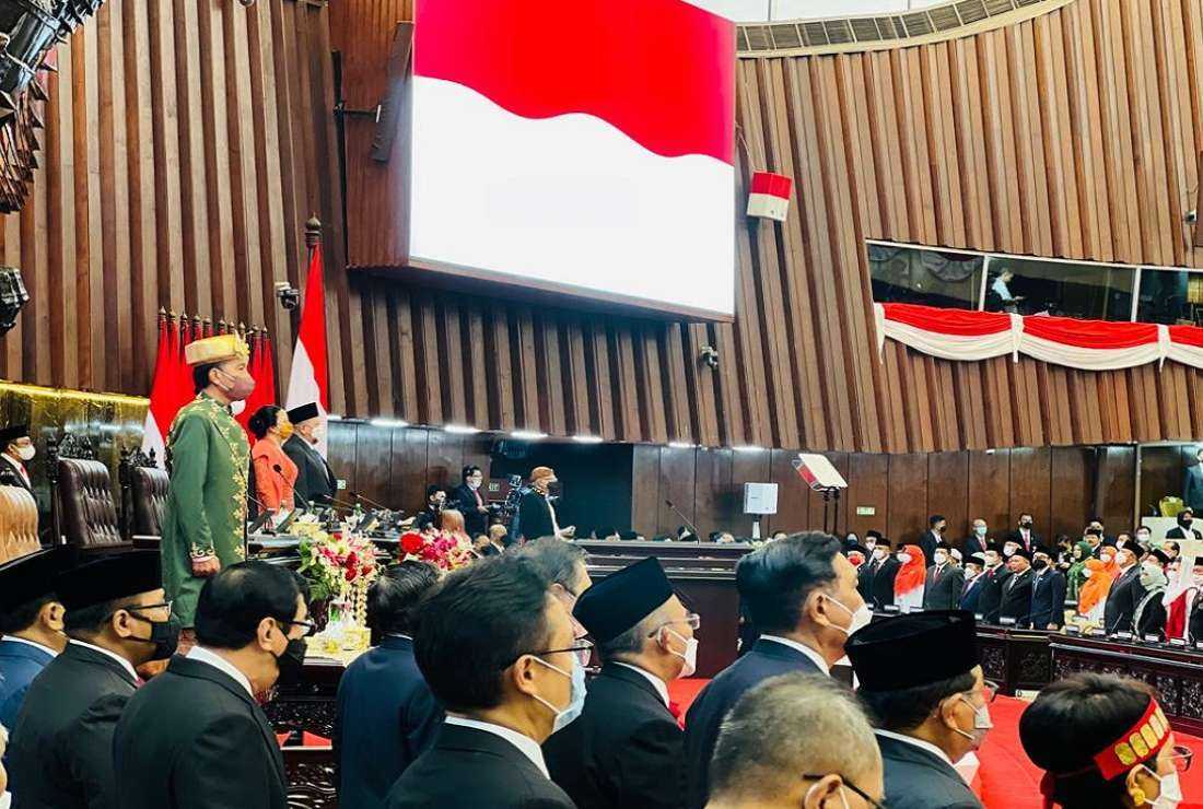 President Joko Widodo, wearing green traditional attire, delivers the State of the Nation address on Aug. 16 in front of parliament in Jakarta