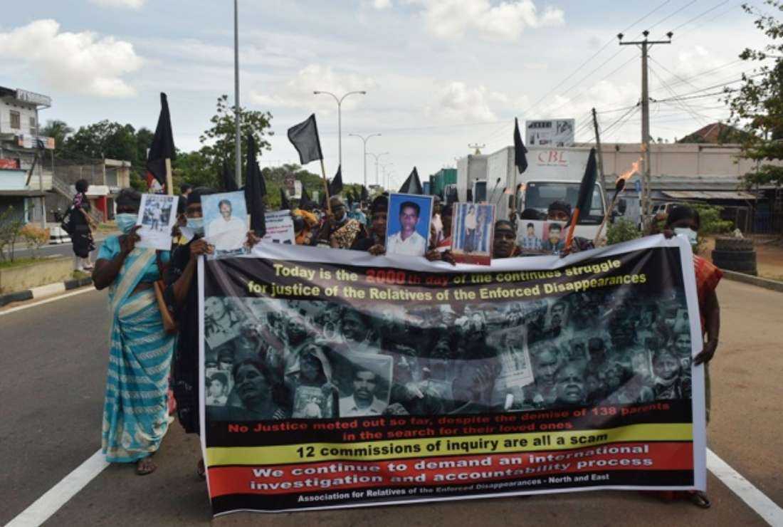 Families of disappeared persons demonstrate on the streets marking the 2,000th day of their protests in Kilinochchi in northern Sri Lanka on Aug. 12