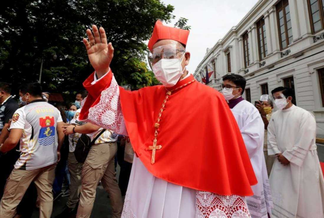 Manila Archbishop Cardinal Jose Fuerte Advincula waves before his installation ceremony in Manila on June 24, 2021