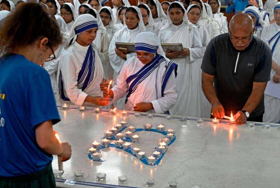 Nuns from Missionaries of Charity attend a special prayer on the occasion of “Peace Day“ to mark the 25th death anniversary of Mother Teresa at the Mother House in Kolkata on Sept. 5