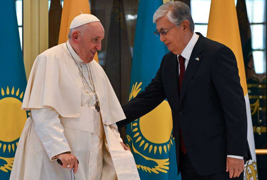 Pope Francis is welcomed by Kazakh President Kassym-Jomart Tokayev upon his arrival at Nur-Sultan International Airport in Nur-Sultan on Sept.