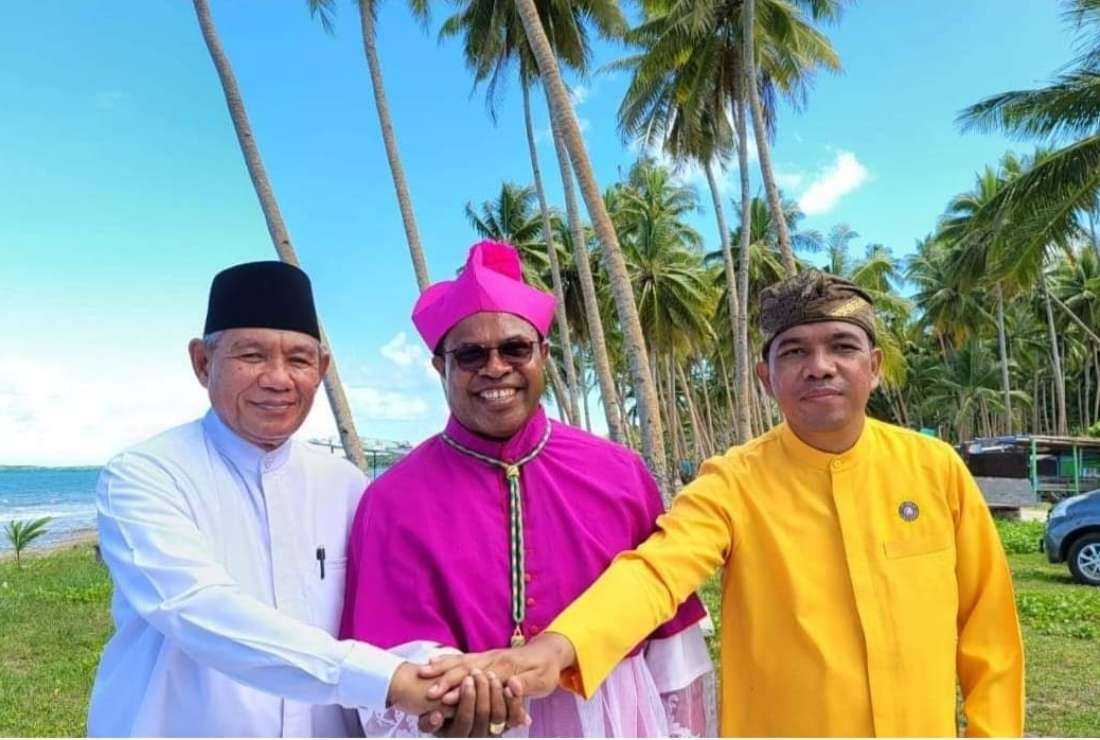 Bishop Seno Inno Ngutra of Amboina Diocese is seen with leaders of other faiths