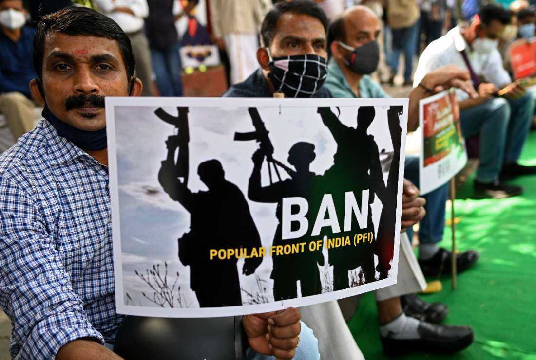 India's ruling Bharatiya Janata Party supporters take part in a protest demanding a ban on the Popular Front of India (PFI) in capital New Delhi on Feb. 28, 2021