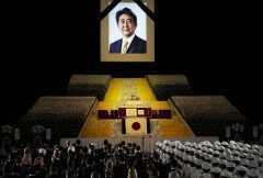 Japan honors Shinzo Abe at controversial funeral