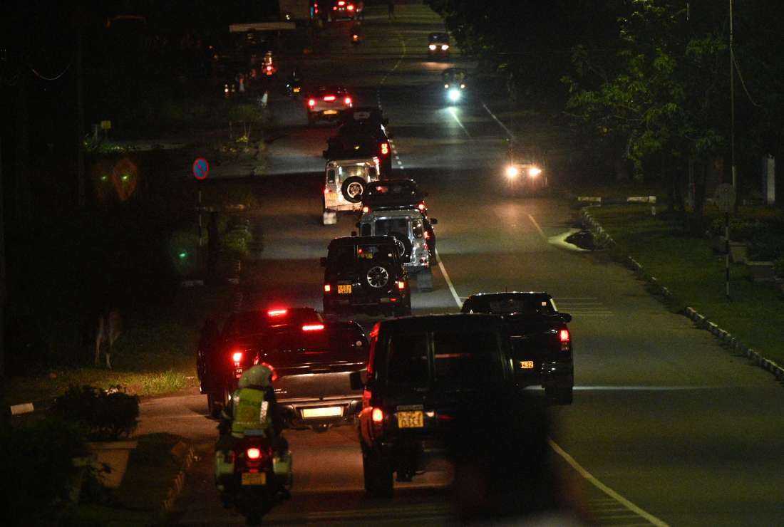 A convoy of vehicles said to be transporting former Sri Lankan President Gotabaya Rajapaksa leaves Bandaranaike International Airport in Colombo early Sept. 3