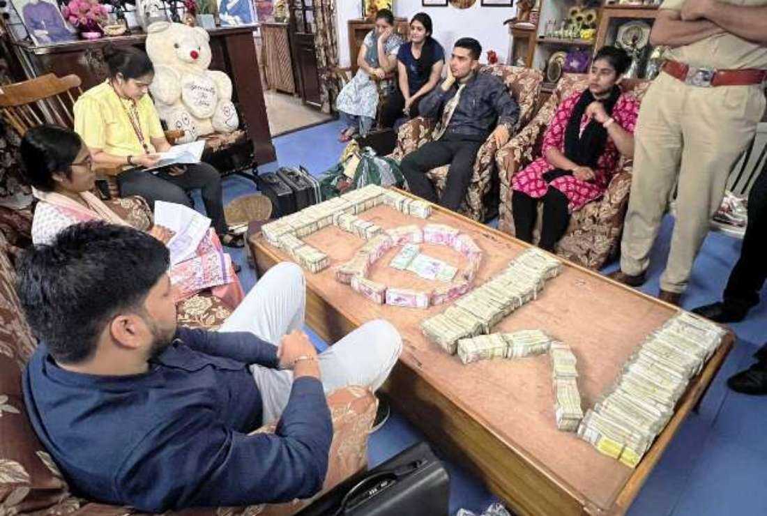 Indian police display bundles of Indian currency they claimed to have seized from the house of Church of North India Bishop P. C. Singh of Jabalpur diocese in Madhya Pradesh on Sept. 8