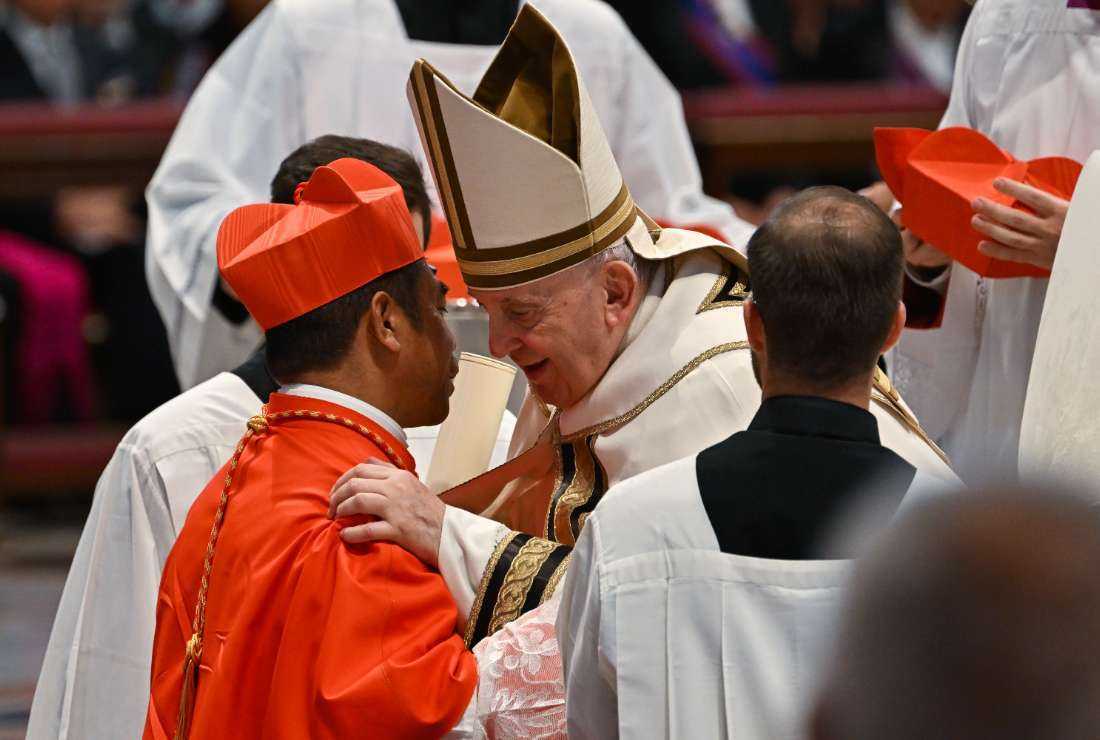 Pope Francis embraces Monsignor Virgilio Do Carmo Da Silva (left) after he elevated him to Cardinal during a consistory to create 20 new cardinals at St. Peter's Basilica in The Vatican on Aug. 27
