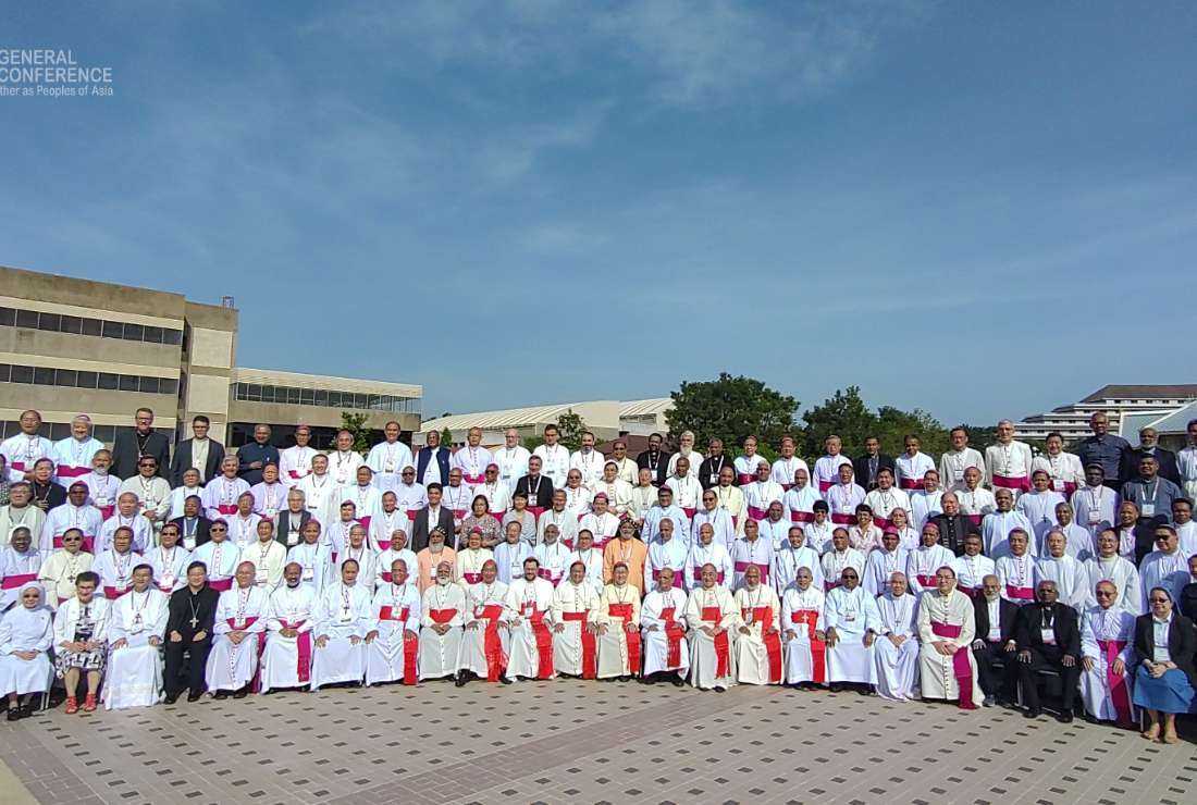Church leaders and delegates from 20 Asian countries pose for a group photo during the FABC 50 general conference in Bangkok