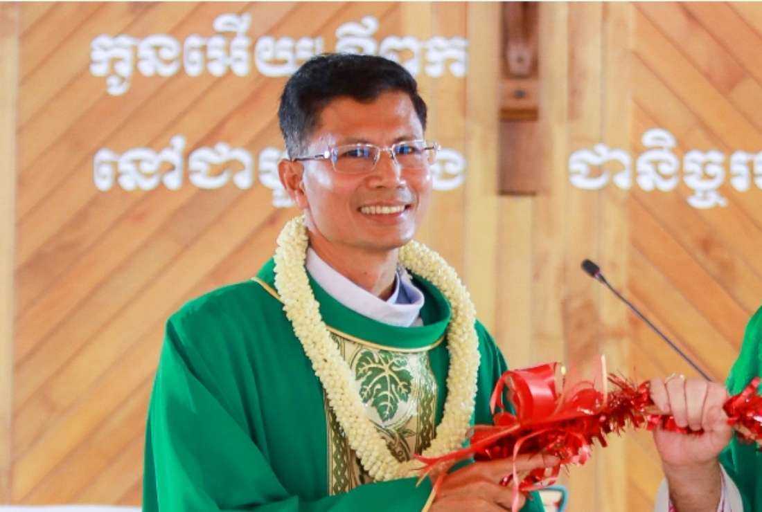 Father Pierre Suon Hangly, the new apostolic prefect of Kampong Cham, at a felicitation during the installation ceremony led by Bishop Olivier Schmitthaeusler (MEP), the apostolic vicar of Phnom Penh, on Sept. 11