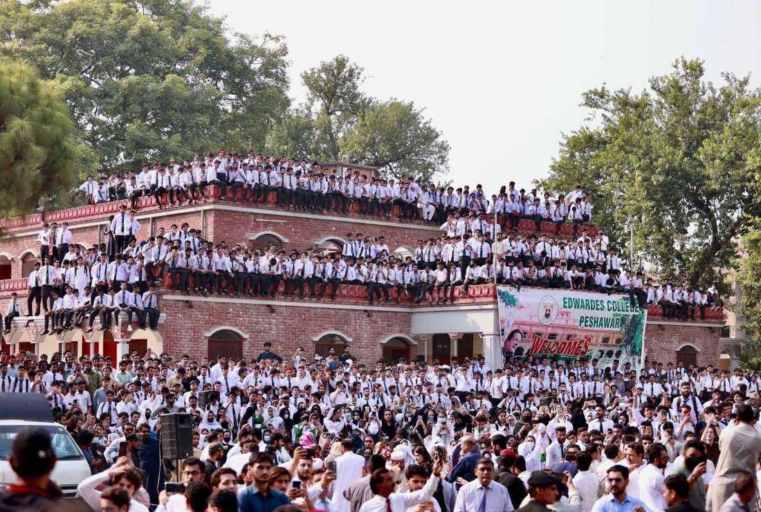 Students attend a rally at Christian-run Edwardes College in Peshawar of Pakistan organized by the party of former Prime Minister Imran Khan on Sept. 30