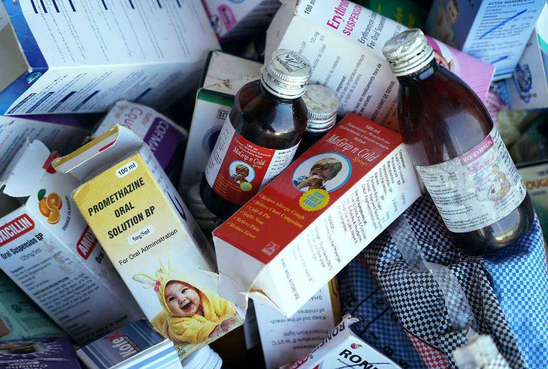 A photograph shows collected cough syrups in Banjul,  the capital of the Gambia