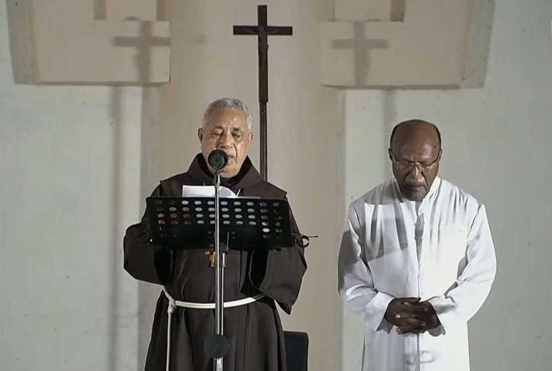Retired Franciscan Bishop Leo Laba Ladjar (left) of Jayapura Diocese in Papua, Indonesia announces the name of Father Yanuarius Theofilus Matopai You (right) as his successor on Oct. 29