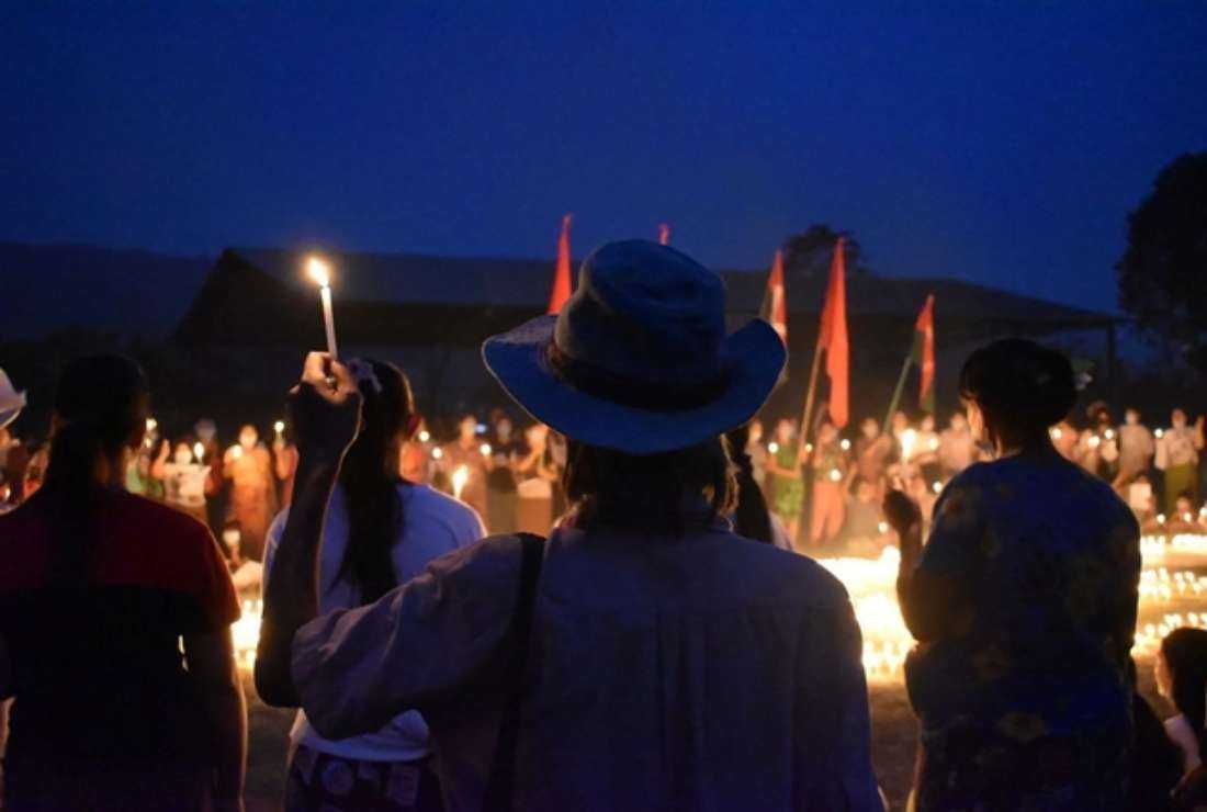 People taking part in a candlelight protest during a demonstration against the military coup in Hpakant township in Myanmar's northern Kachin state. At least 80 people were killed at a concert in A Nang Pa, a village in Hpaknat township, when it was attacked by three fighter jets on Oct 23