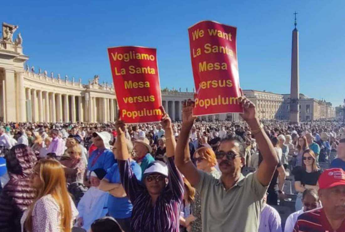People from Eastern-rite Syro-Malabar Church, based in southern Kerala state in India, demonstrate with placards during the general audience of Pope Francis in the Vatican on Oct. 5 demanding to allow their priests to say Mass facing the people