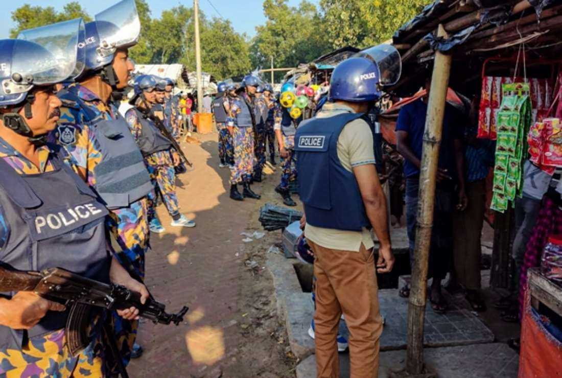 Bangladesh police stand guard during a crackdown against suspected criminals and insurgents in a Rohingya refugee camp in Ukhia in this handout photograph taken on Oct. 28. (Photo: Bangladesh Armed Police Battalion